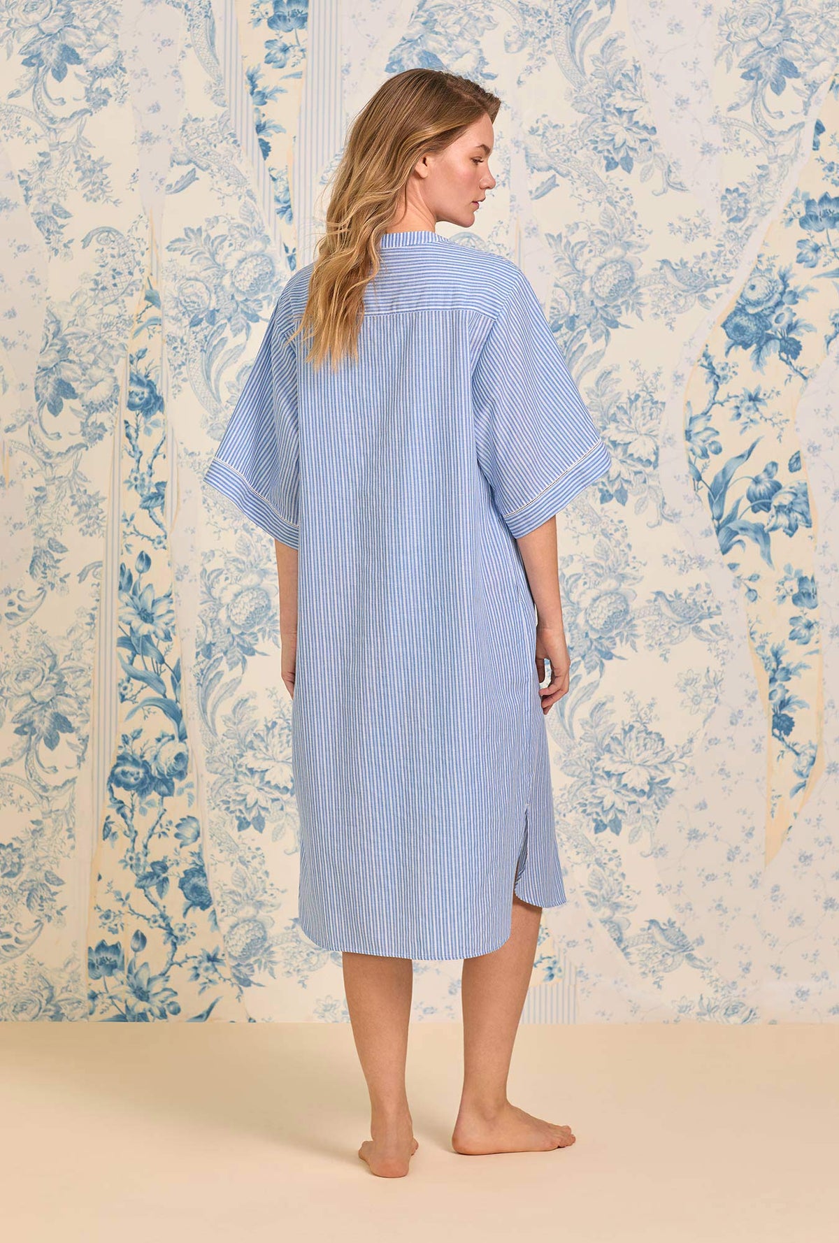 A lady wearing The &quot;Lana&quot; Classic Cotton Stripe Caftan