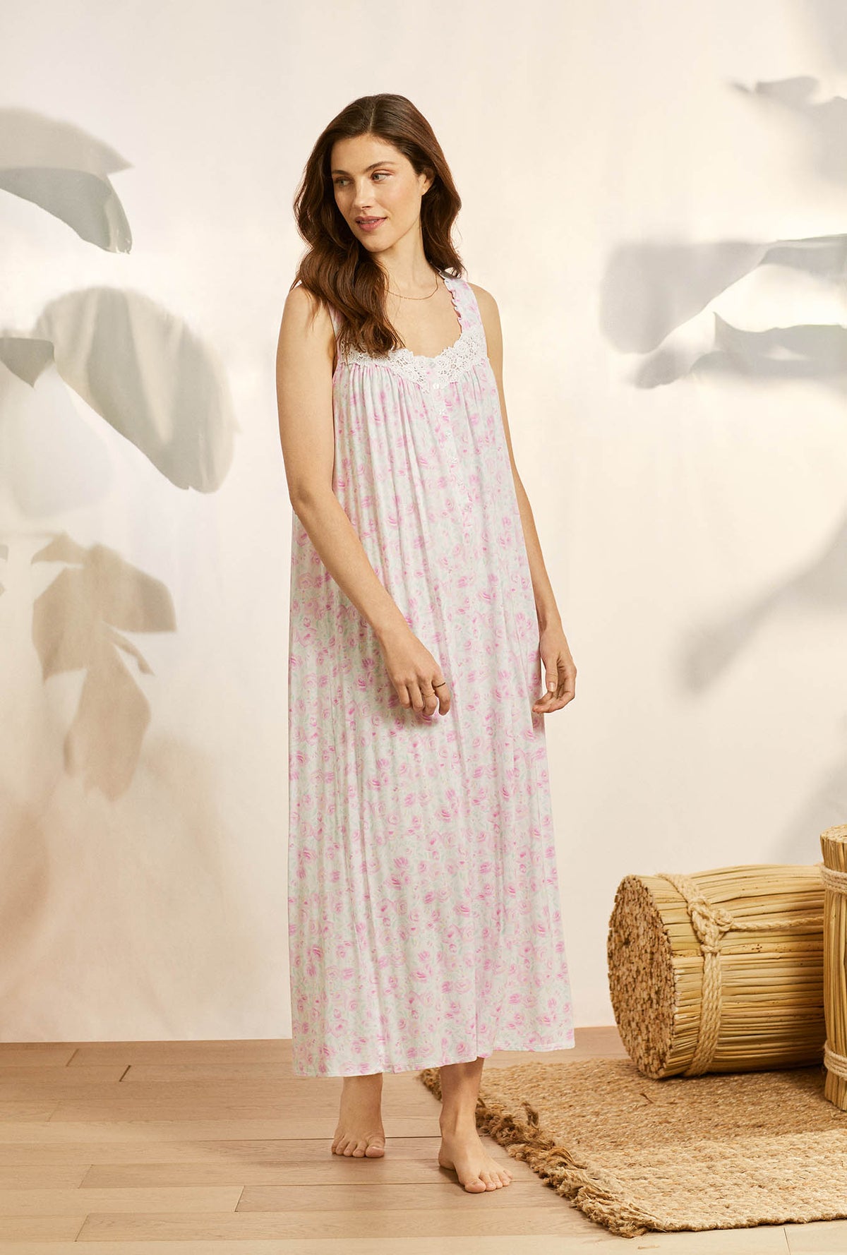 A lady wearing pink sleeveless knit eileen nightgown with tencel rosey daydream print.