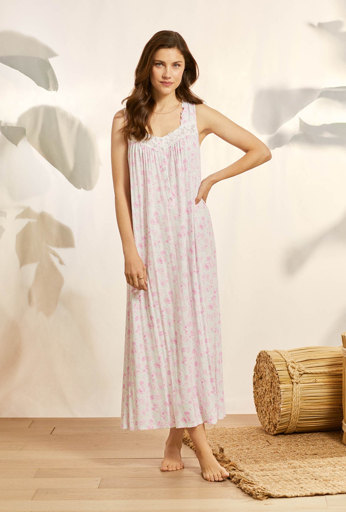 A lady wearing pink sleeveless knit eileen nightgown with tencel rosey daydream print.