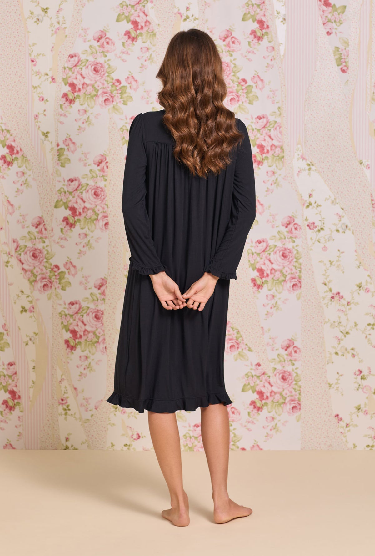 A lady wearing Iconic Black Tencel™ Modal Long Sleeve Ballet Nightgown