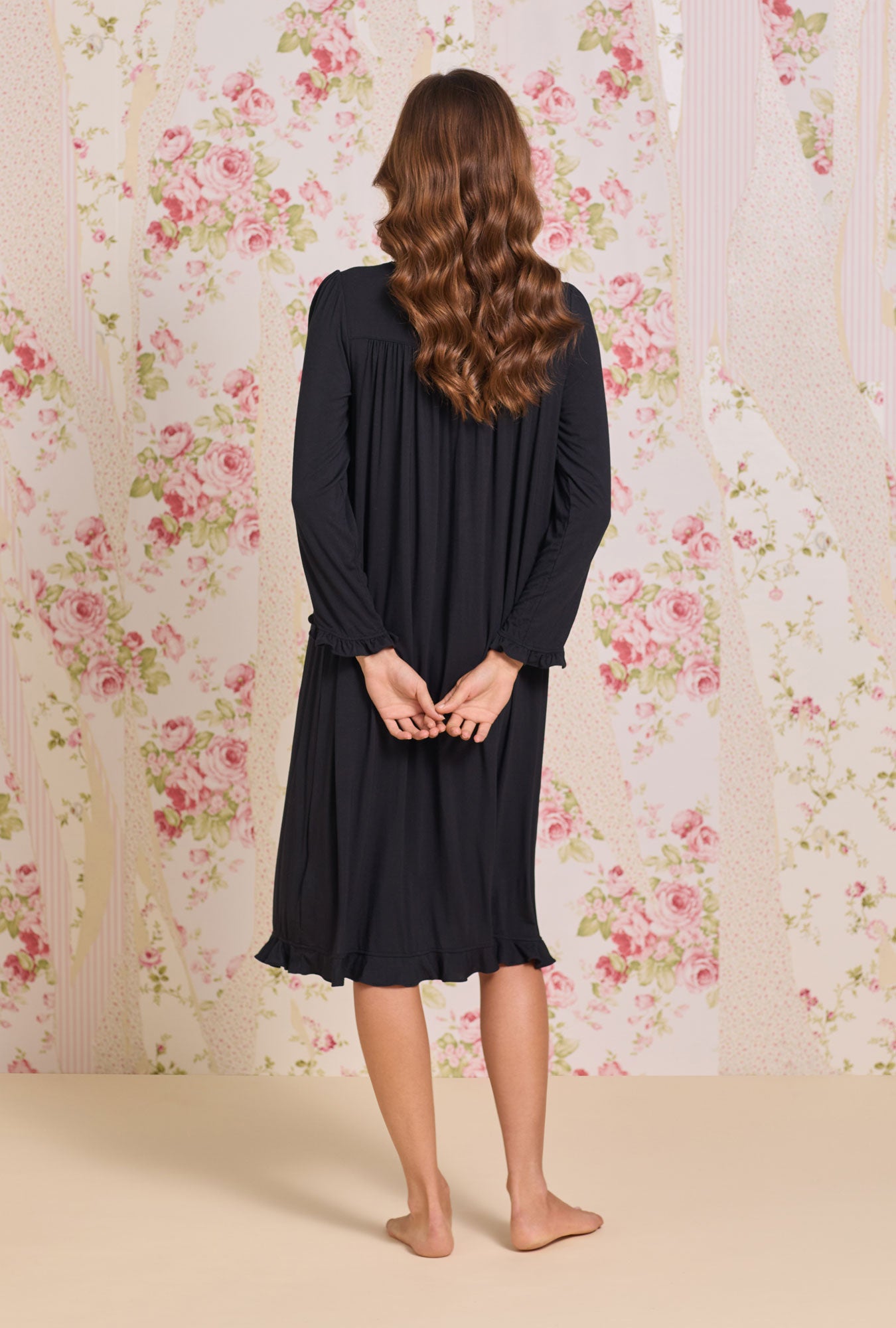 A lady wearing Iconic Black Tencel™ Modal Long Sleeve Ballet Nightgown