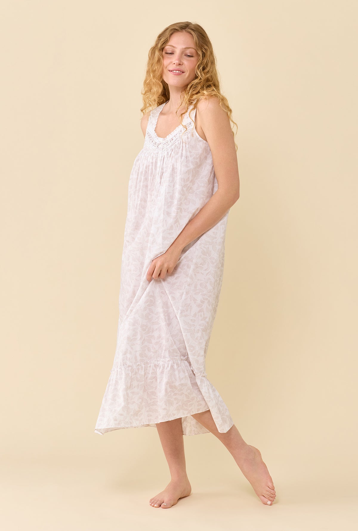 A Lady Wearing The Eileen Cottage Fern Nightgown in a side angled pose