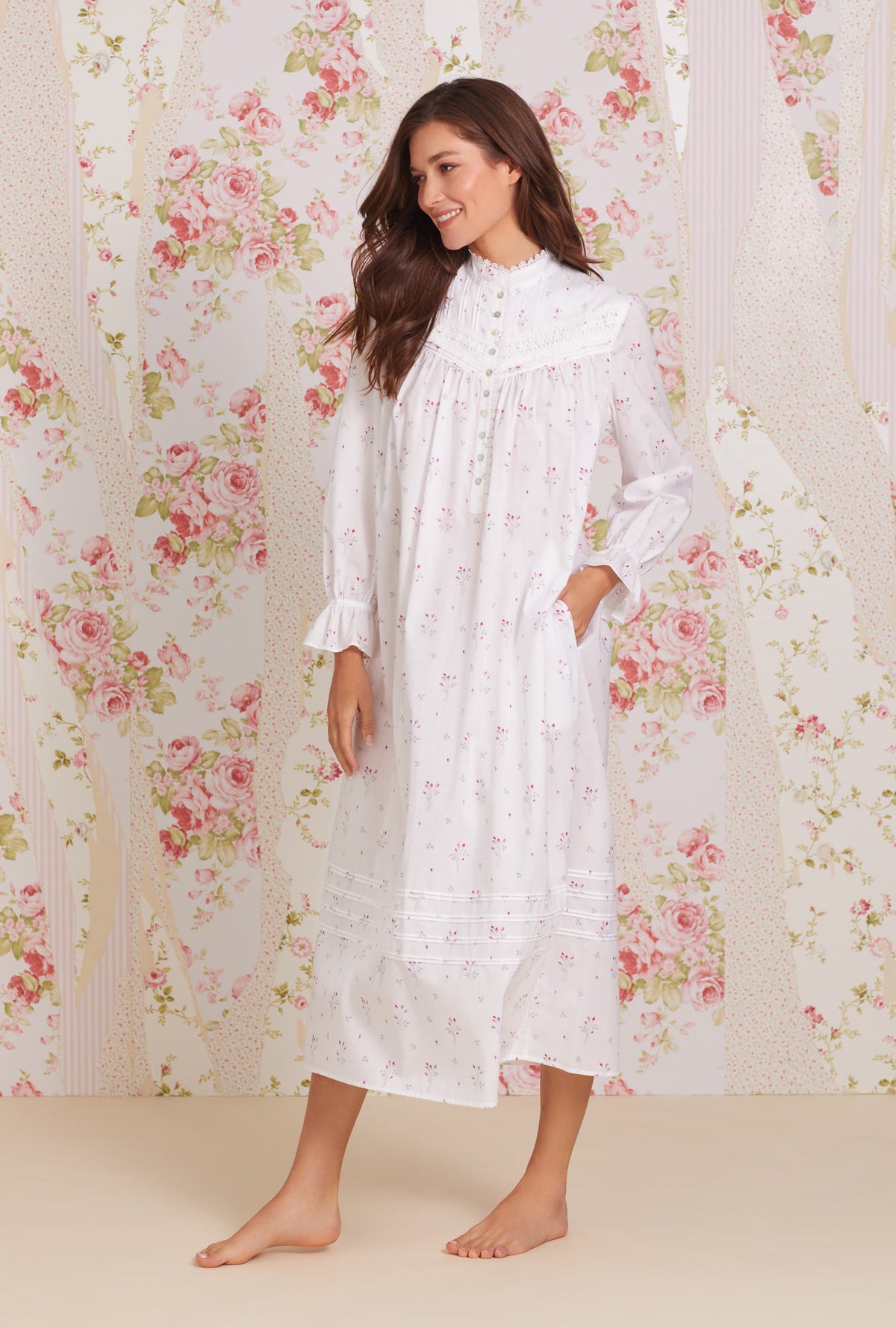 A lady wearing white  Long Sleeve Cotton Lawn Highneck Nightgown with Dream Bouque print