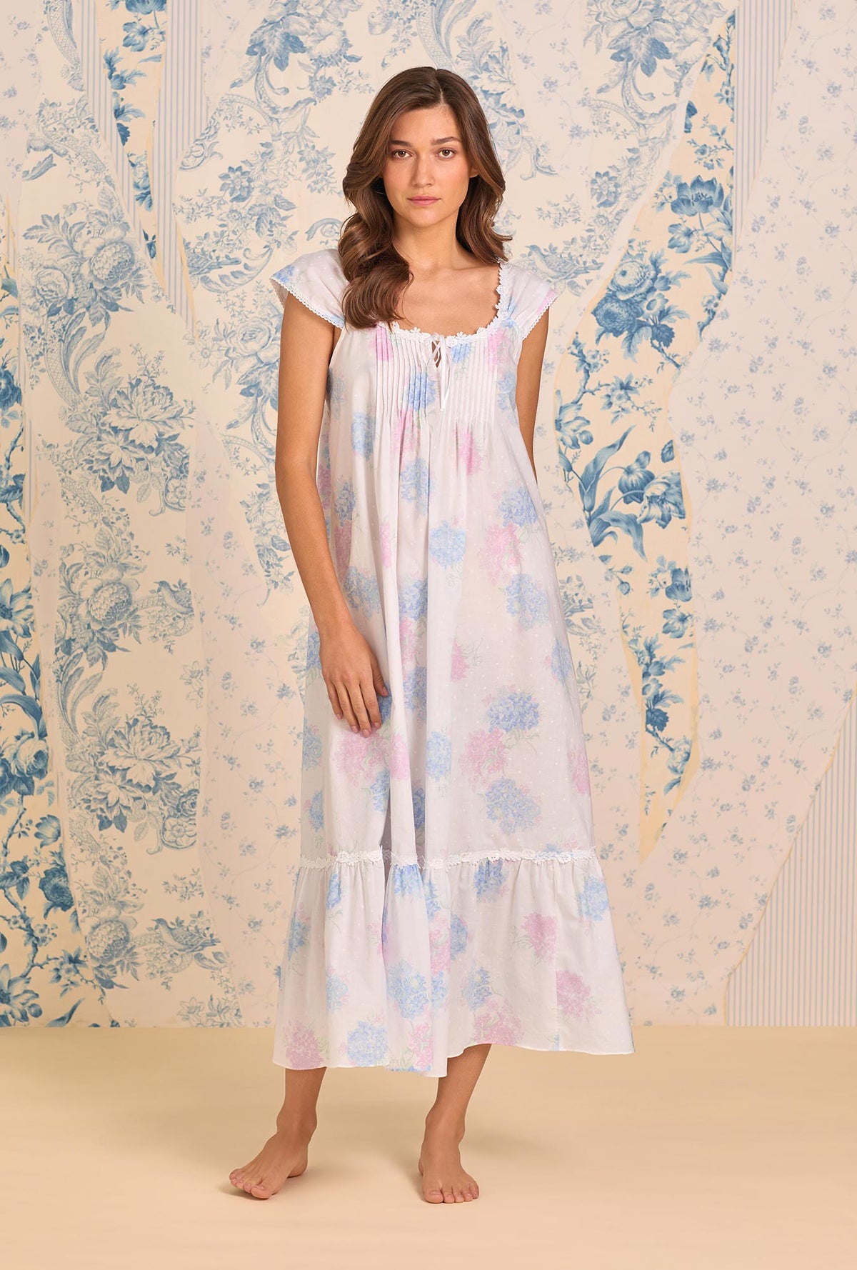 A lady wearing The "Taylor" Hydrangea Blossom Cotton Lawn Ballet Nightgown looking front