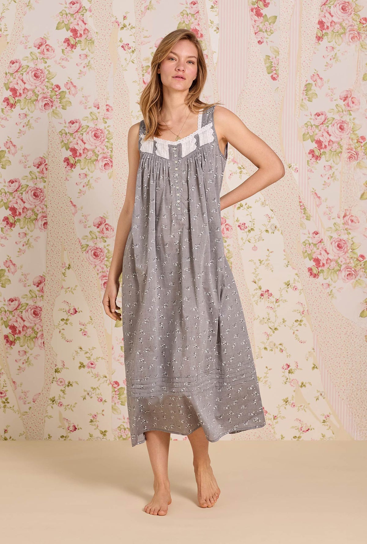 A lady wearing The &quot;Eileen&quot; Pale Meadow Cotton Yarndye Chambray Ballet Nightgown