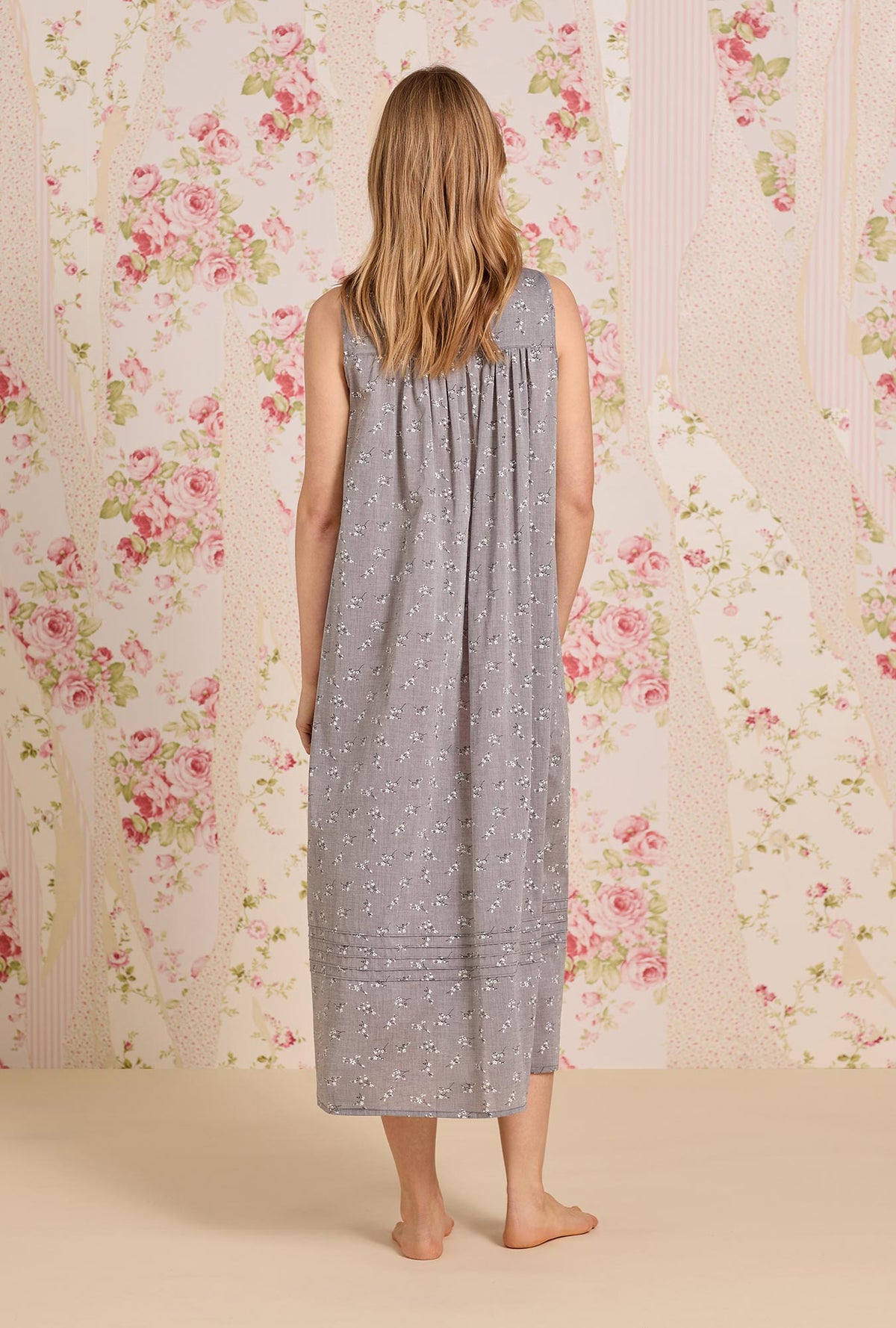 A lady wearing The &quot;Eileen&quot; Pale Meadow Cotton Yarndye Chambray Ballet Nightgown