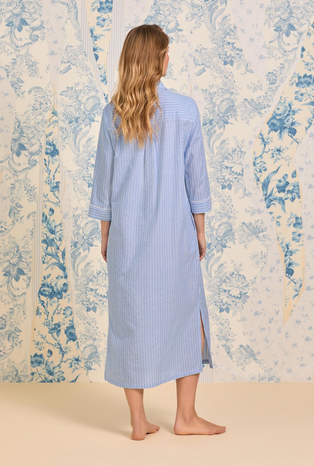 A lady wearing The &quot;Mira&quot; Classic Cotton Stripe Long Shirt Dress