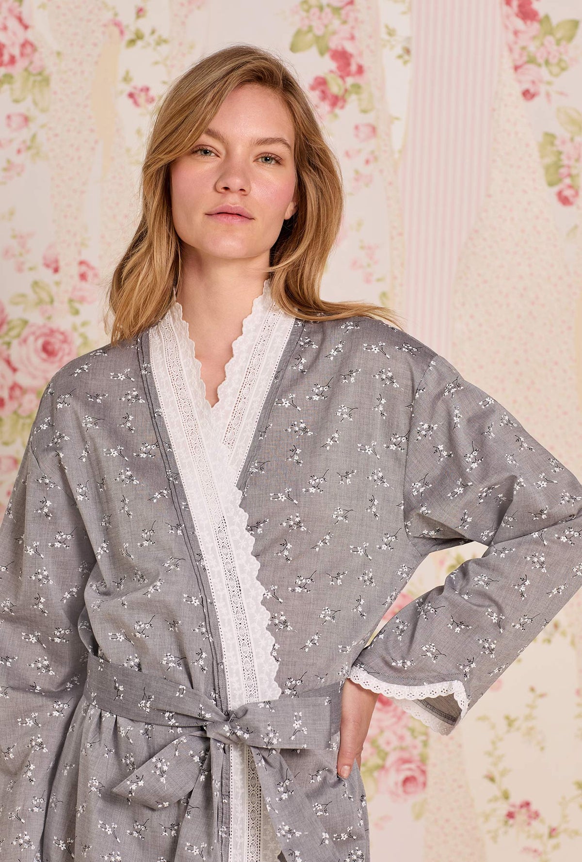A lady wearing Pale Meadow Cotton Yarndye Chambray Wrap Robe