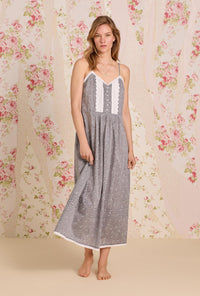 A lady wearing The "Sylvie" Pale Meadow Cotton Yarndye Chambray Ballet Nightgown