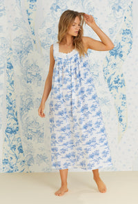 A lady wearing sleeveless french toile eileen cotton woven nightgown.