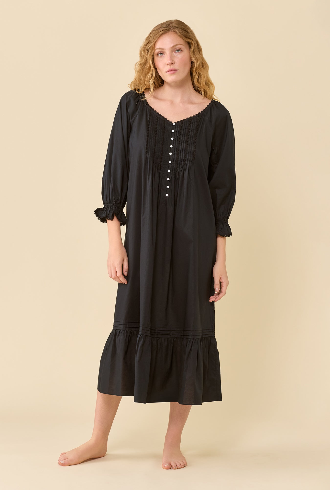 A lady wearing Faye Iconic Black 100% Cotton Woven Lawn 3/4 Sleeve Ballet Nightgown