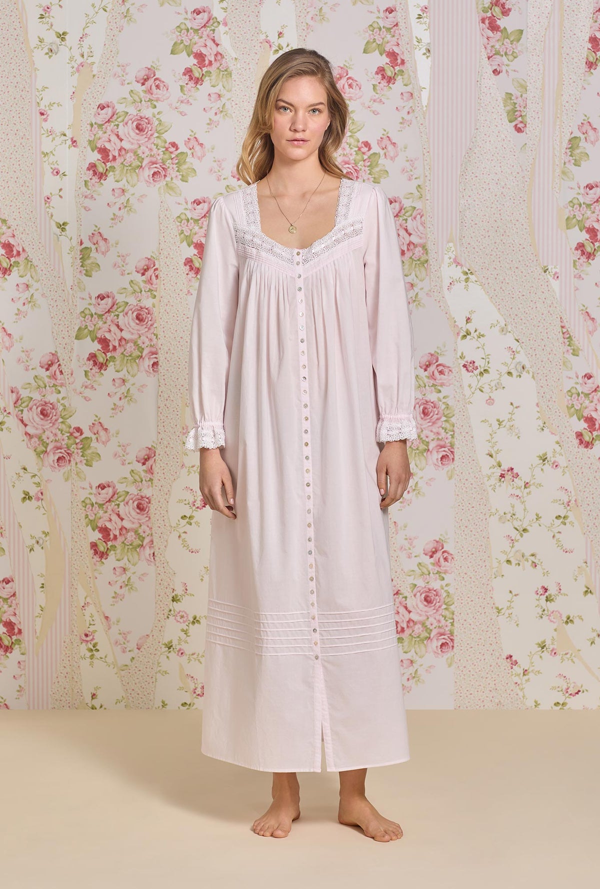 A lady wearing Rosewater Cotton Lawn Button Front Robe