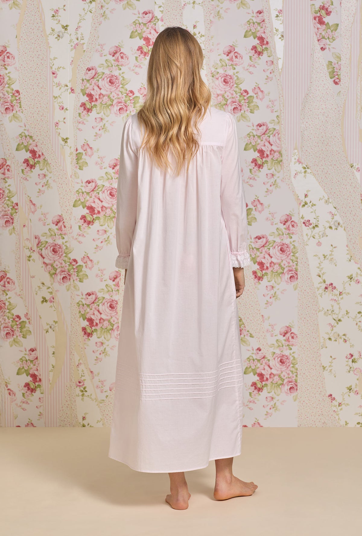 A lady wearing Rosewater Cotton Lawn Button Front Robe