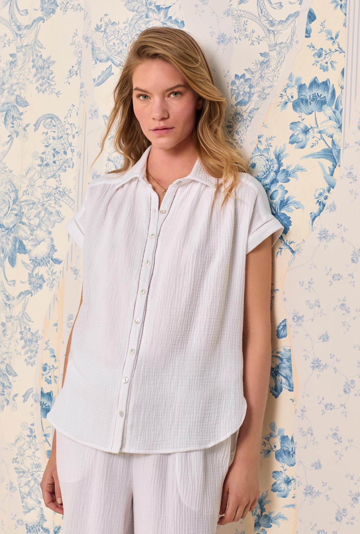 A lady wearing The &quot;Elora&quot; White Crinkle Gauze Lounge Set