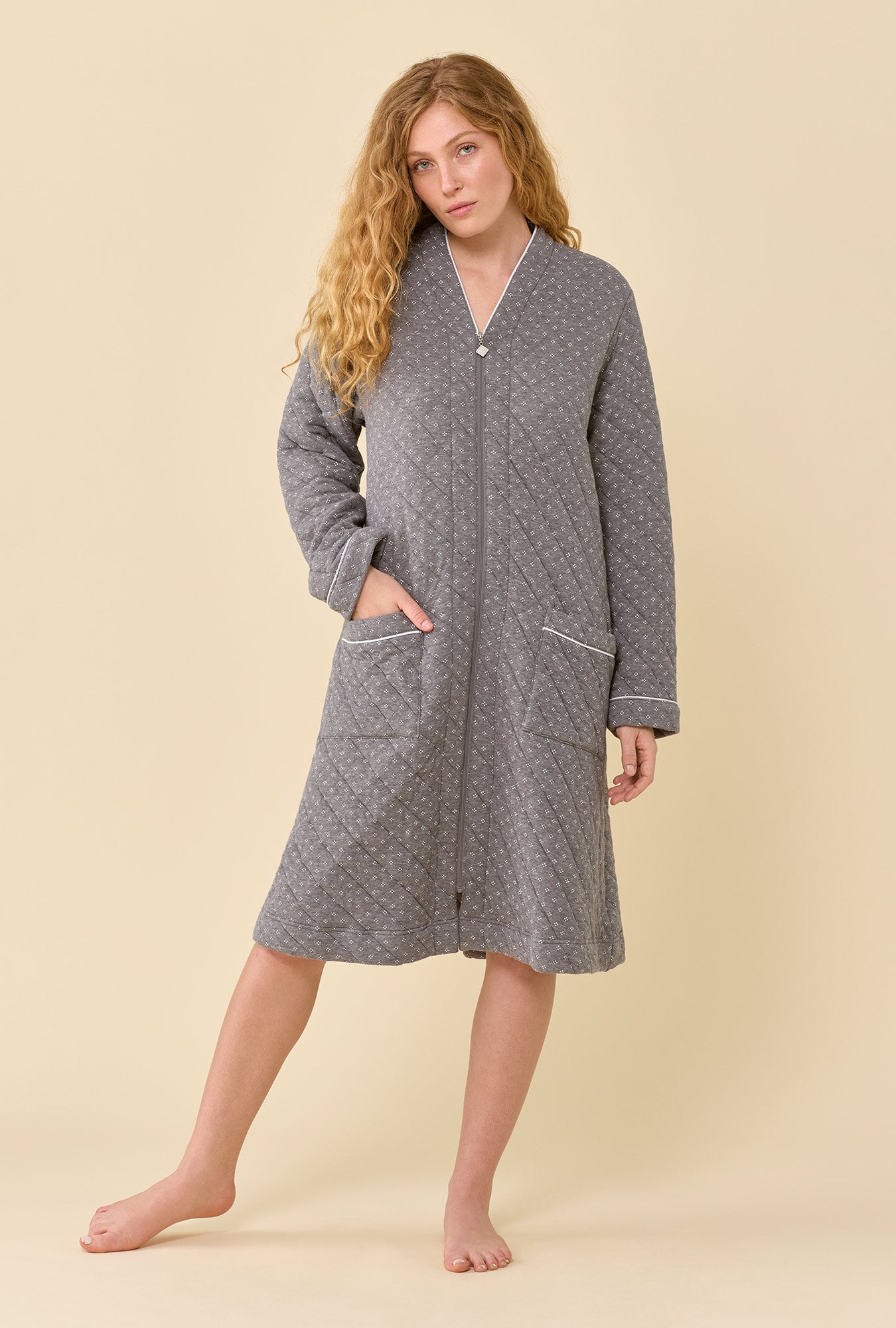 A lady wearing Gray Pearl Cotton Rich Diamond Quilt Waltz Zip Robe
