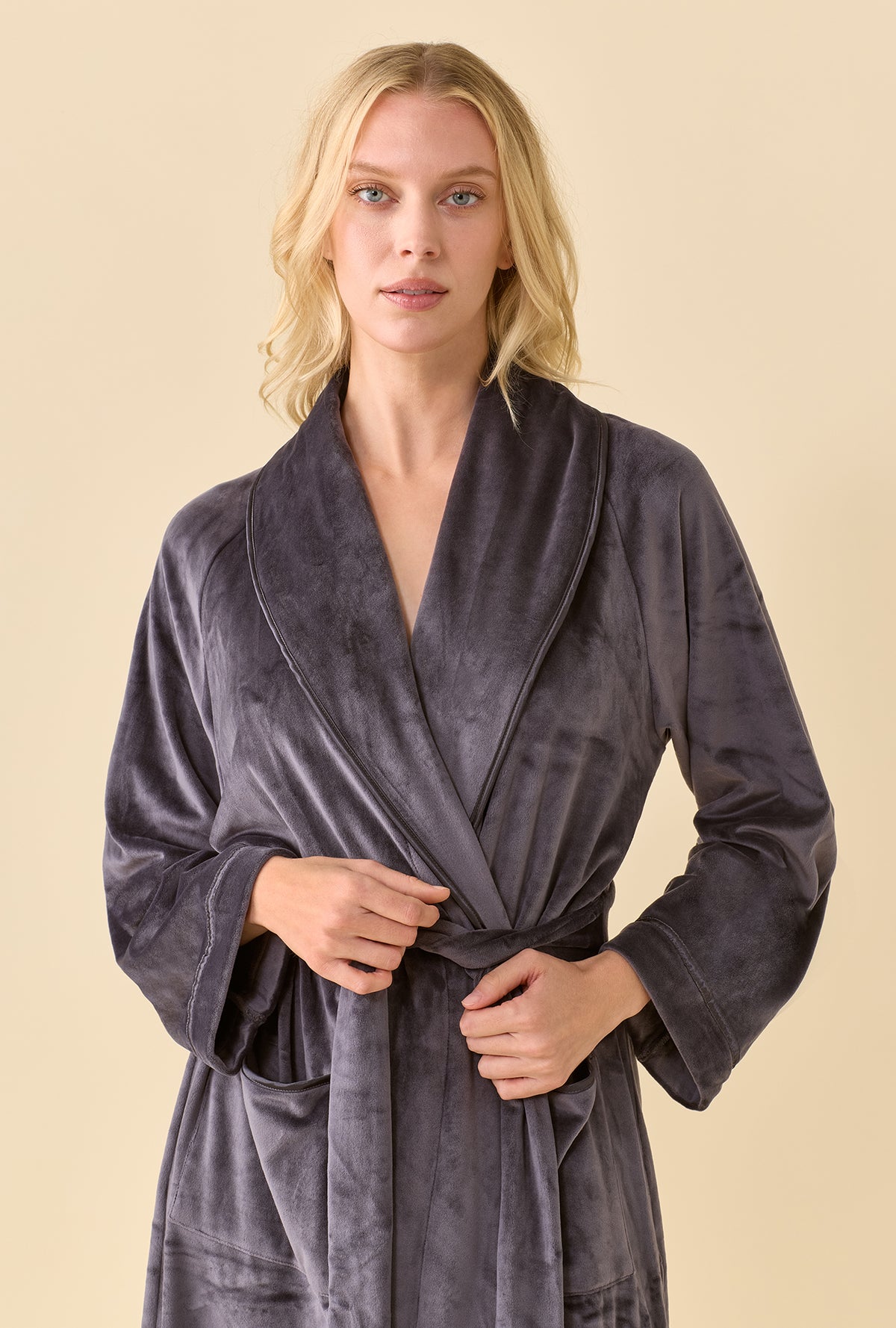 Lux Velour Long Wrap Robe detailed view of the piped shawl collar and cuffs with hands holding the tied belt
