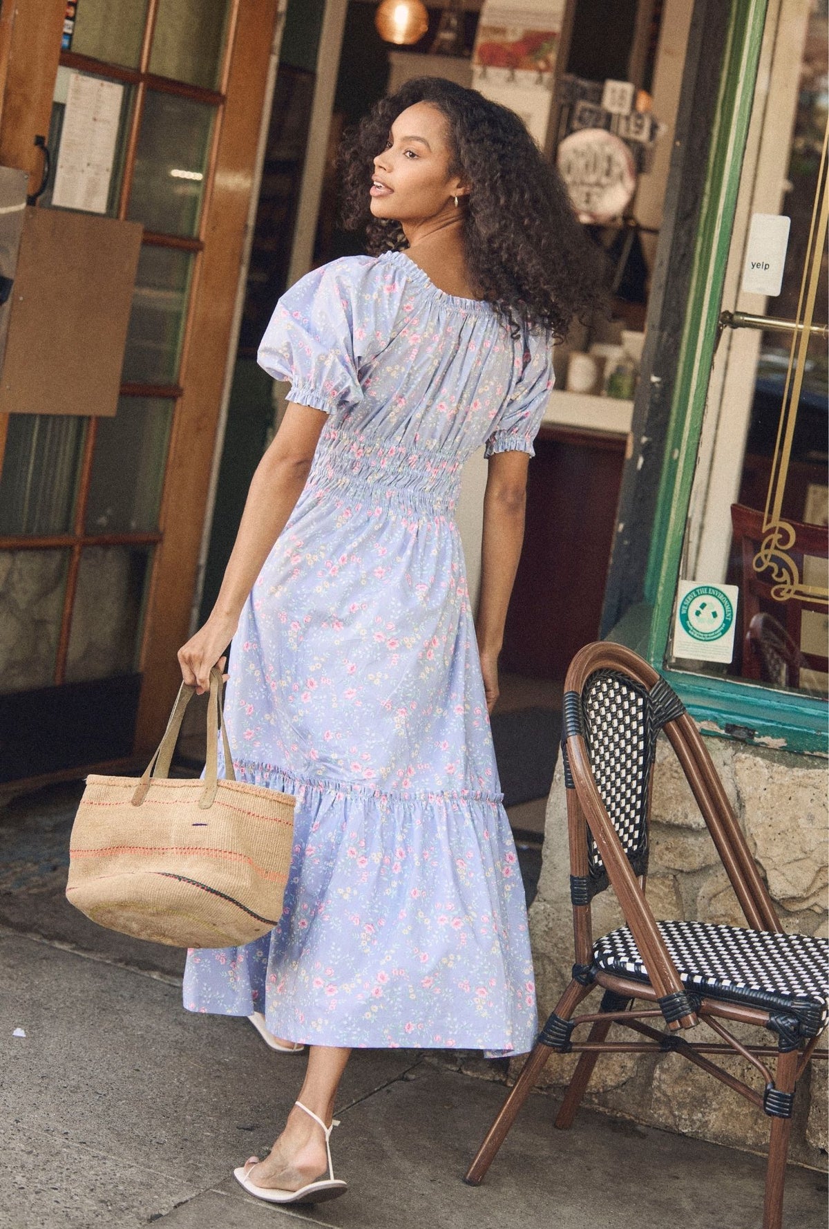 A lady wearing The "Marin" Chambray Rose Cotton Maxi Dress back view