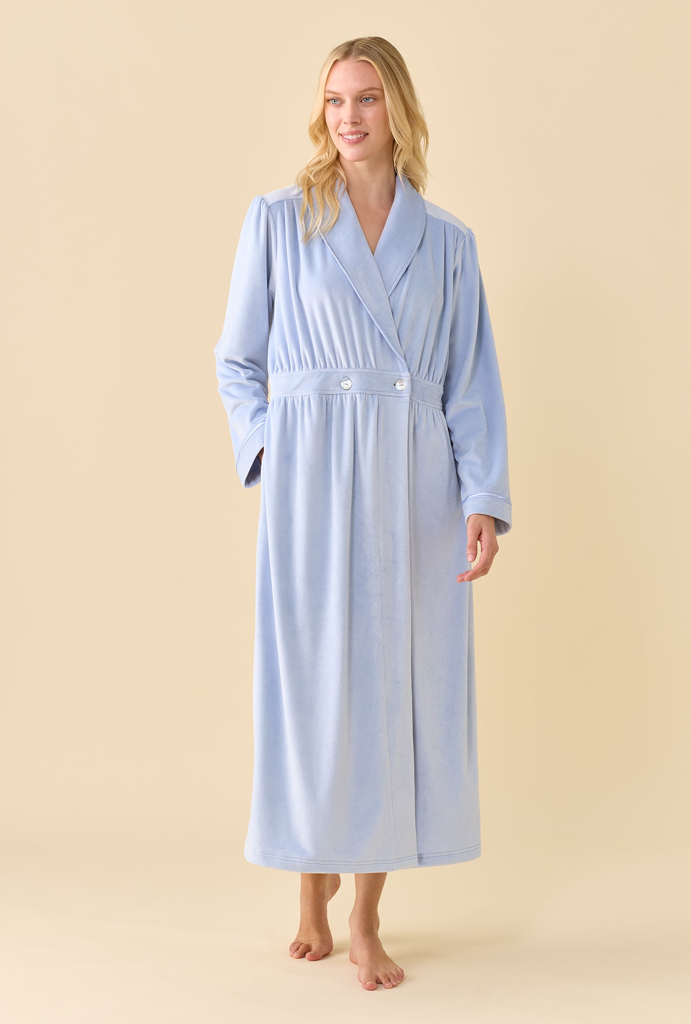 A lady wearing Peri Lux Velour Button Front Robe