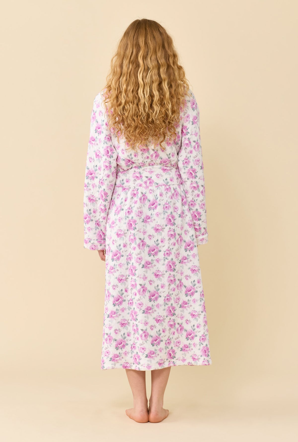A lady wearing Antique Rose Cotton Rich Diamond Quilt Ballet Wrap Robe back view
