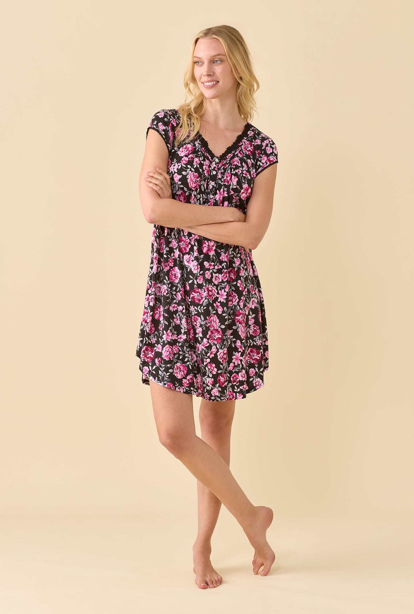 A lady wearing Midnight Briar TENCEL™ Modal Spandex Jersey KnitCap Sleeve Nightshirt looking side