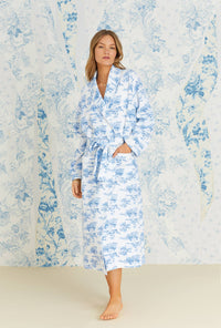 A lady wearing long sleeve french toile diamond quilt long wrap robe.