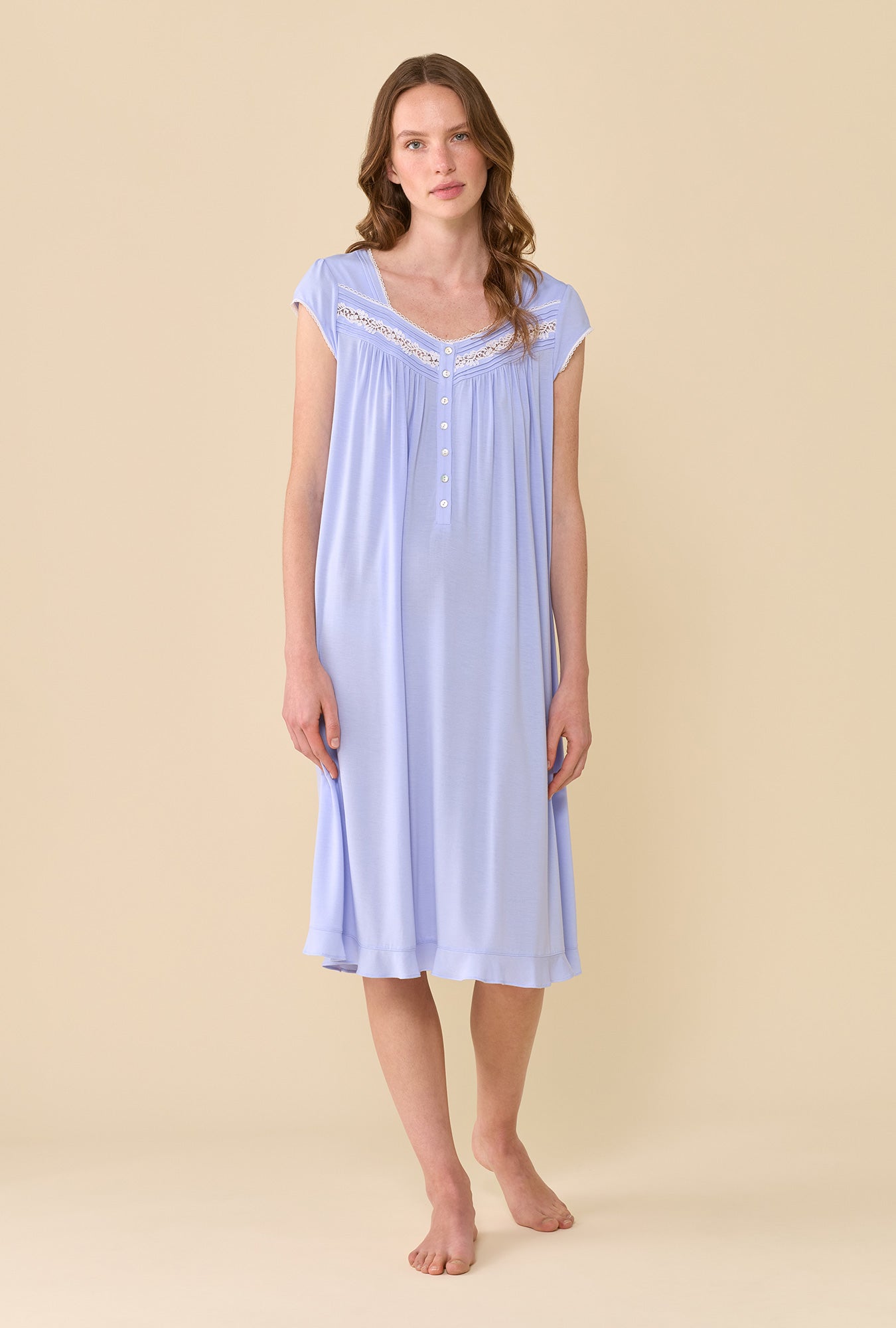 A lady wearing Peri Nightgown looking front