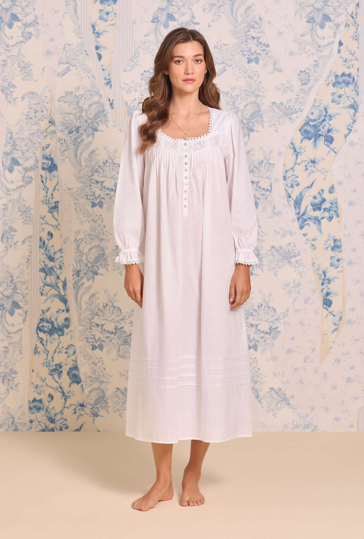 A lady wearing Iconic White Cotton Lawn Long Sleeve Ballet Nightgown
