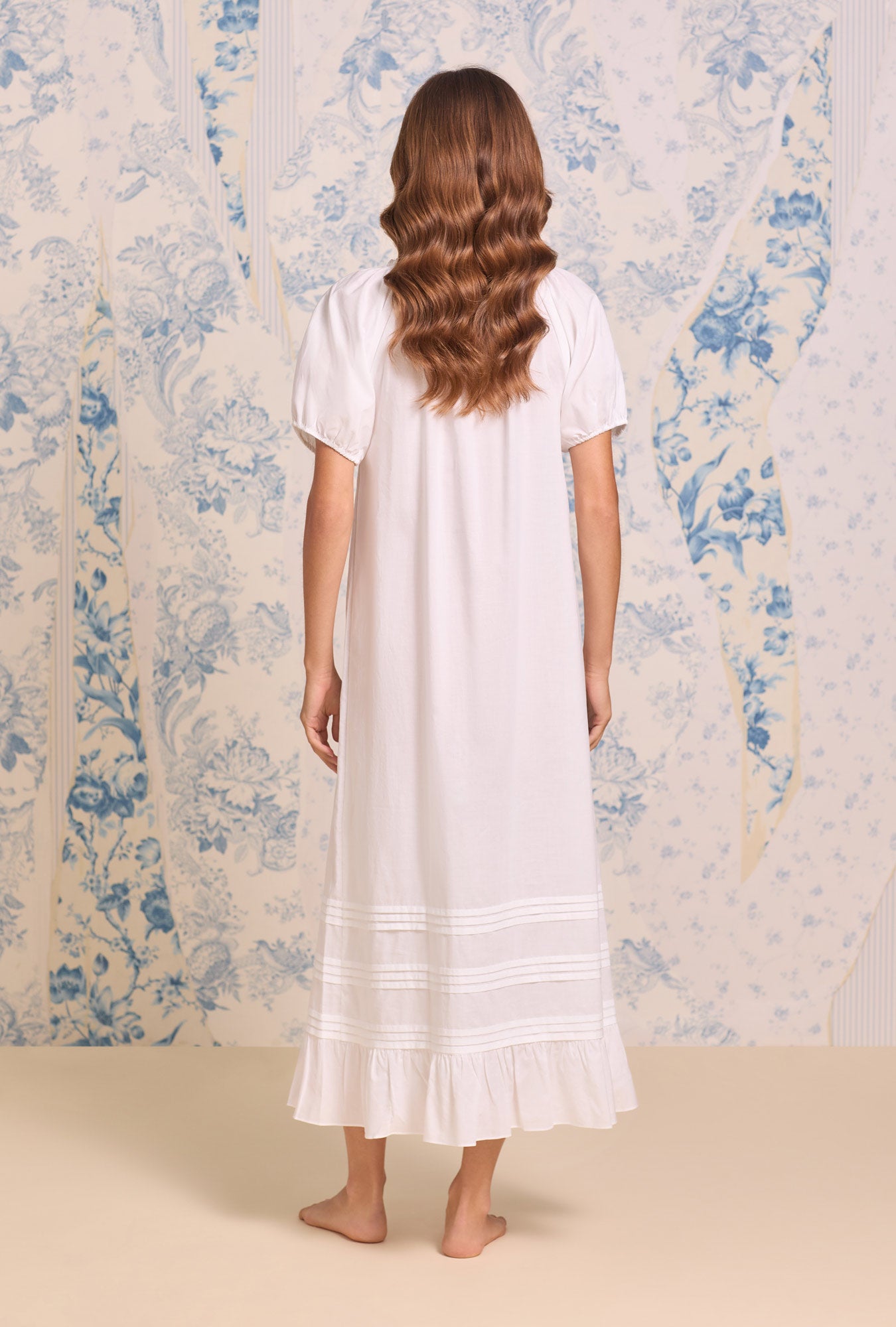A lady wearing the "Jolee" Iconic White Cotton Lawn Ballet Nightgown