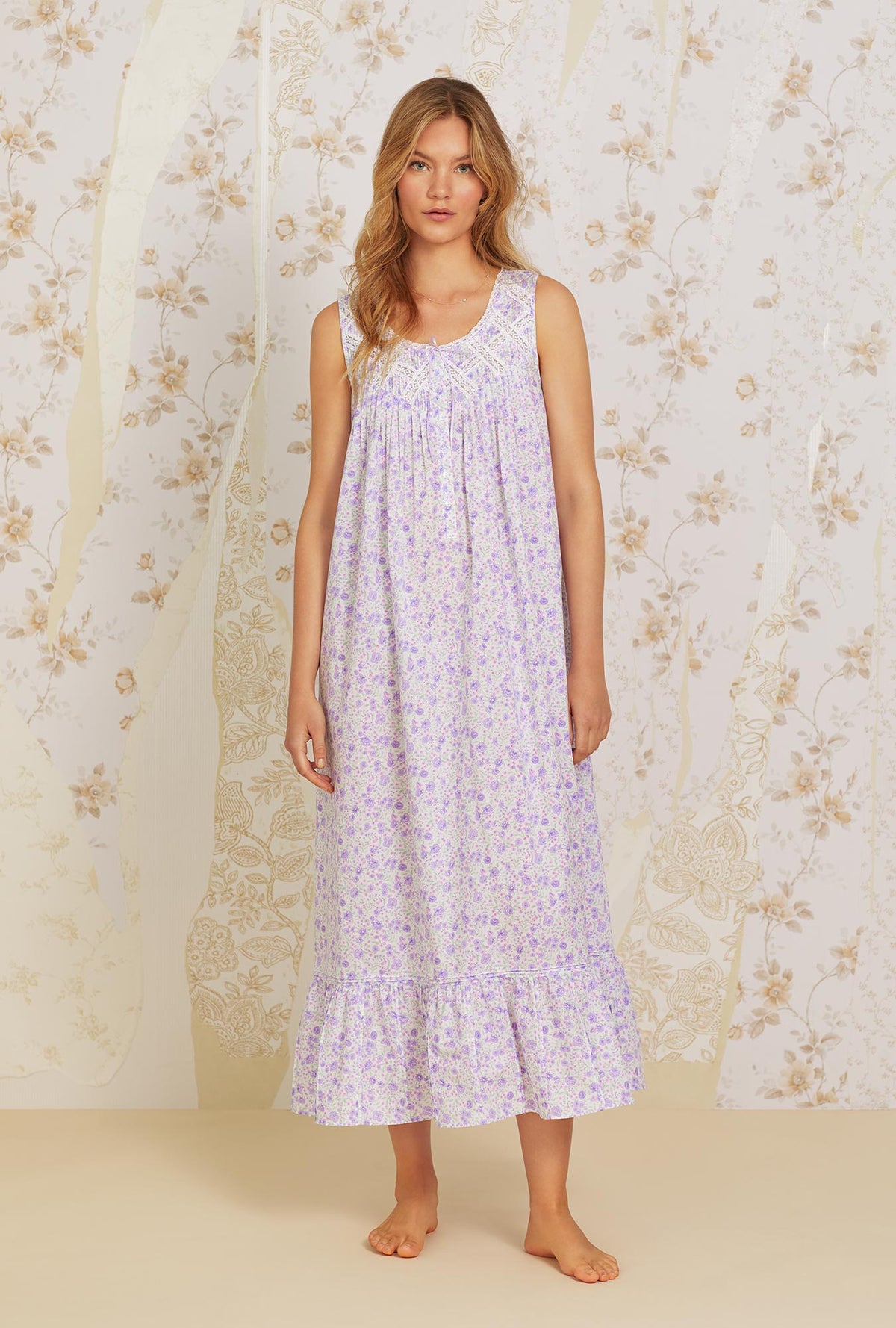 A lady wearing white sleeveless Cotton Nightgown with  Heather Fields print