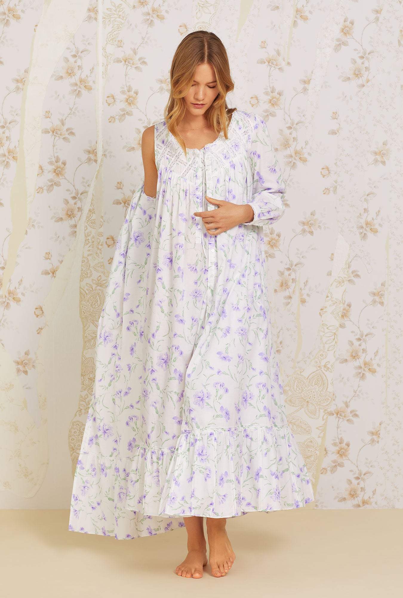 A lady wearing white  long sleeve  Dream Cotton Button Front Robe with Lilac Carnation  print