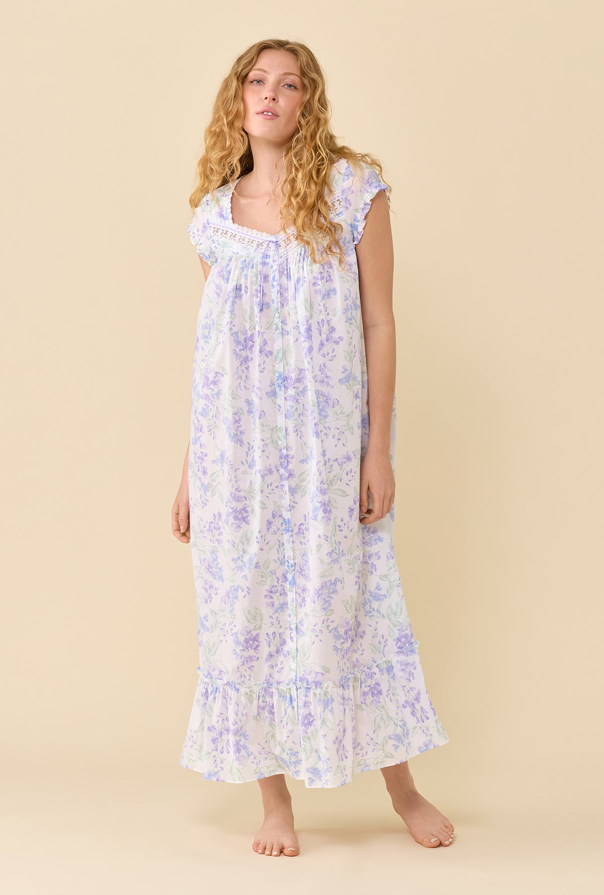 A lady wearing Blooming Arbor Robe looking up