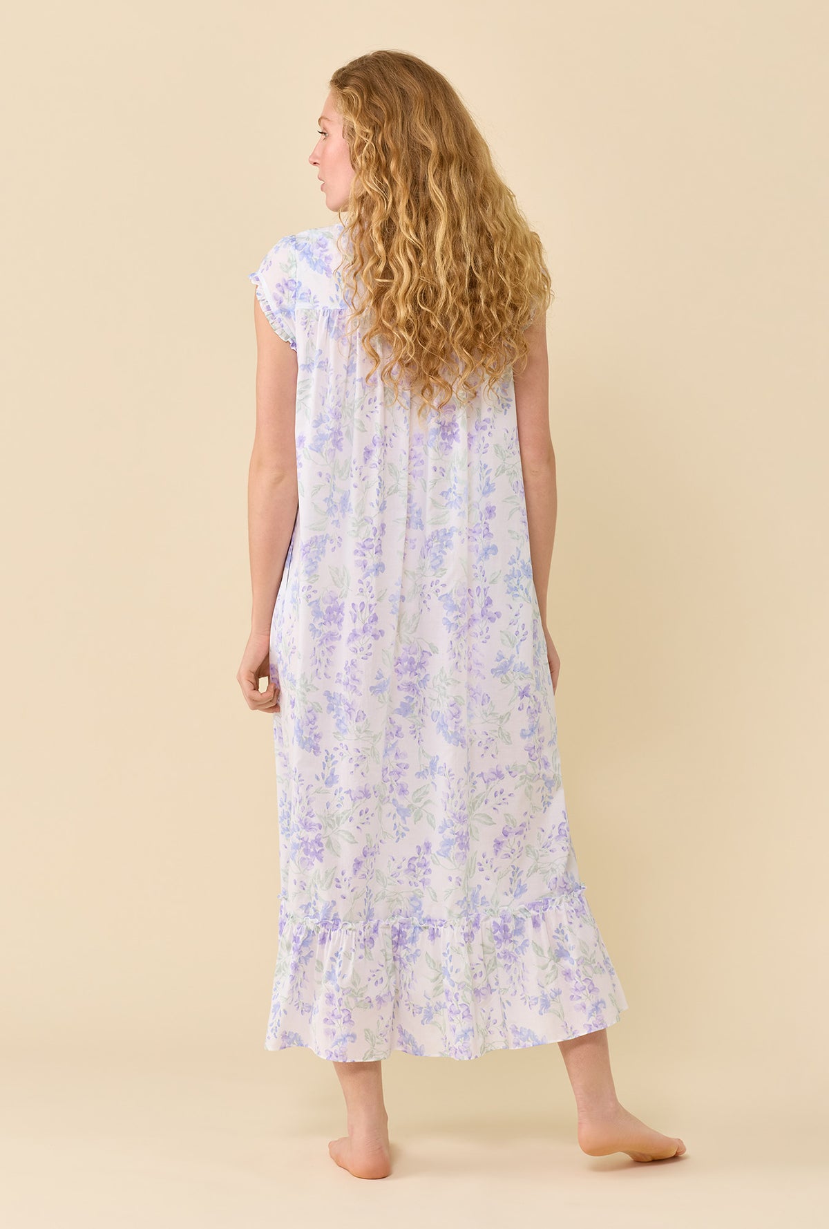 A lady wearing Blooming Arbor Robe back view