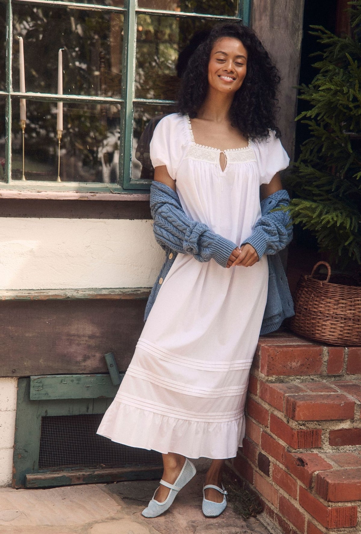 A lady wearing the "Jolee" Iconic White Cotton Lawn Ballet Nightgown
