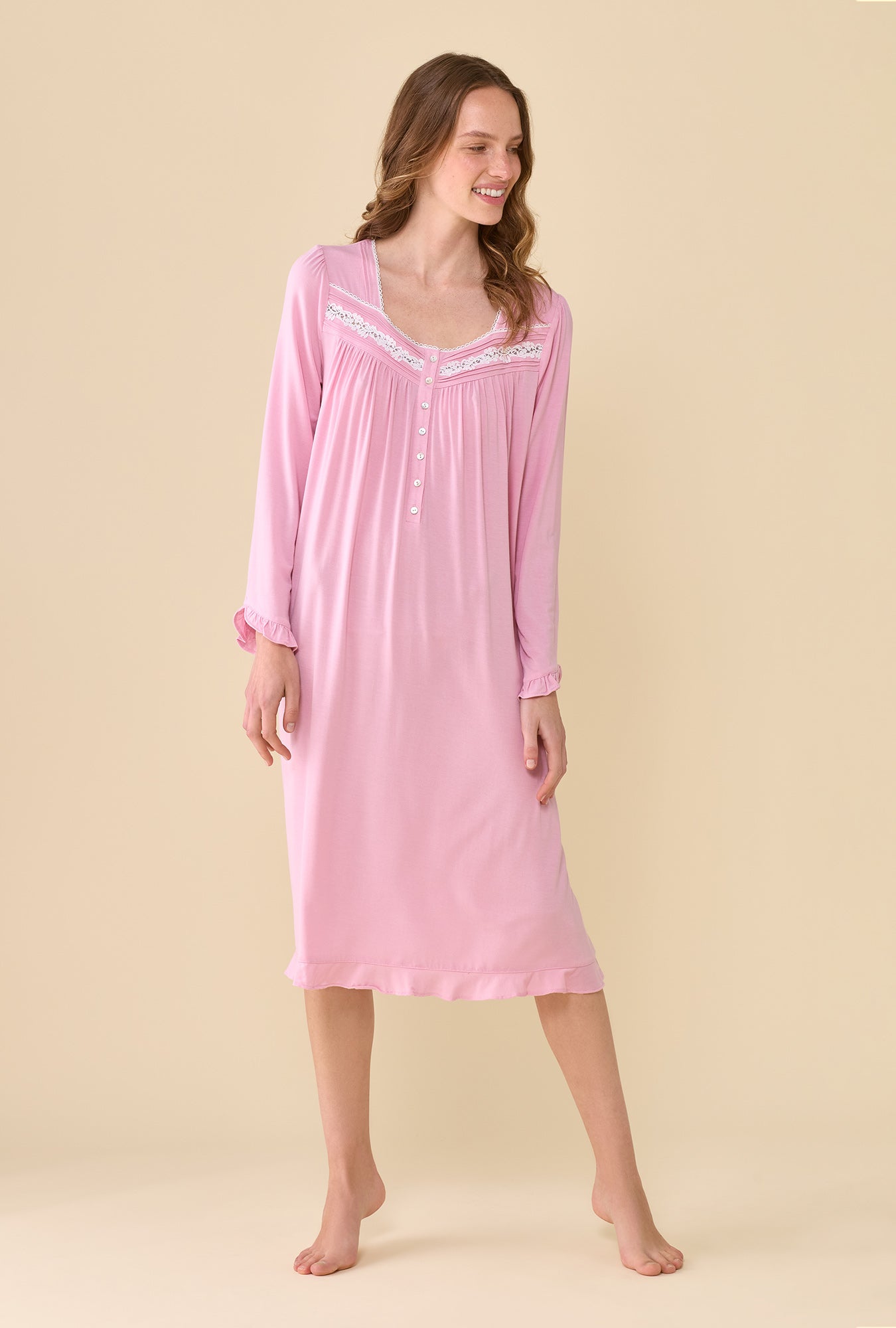 A lady wearing Dusty Rose Long Sleeve Nightgown looking down