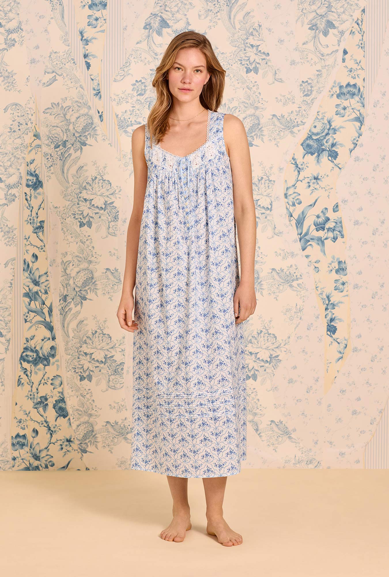 A lady wearing The "Eileen" Celestial Bow Cotton Lawn Ballet Nightgown
