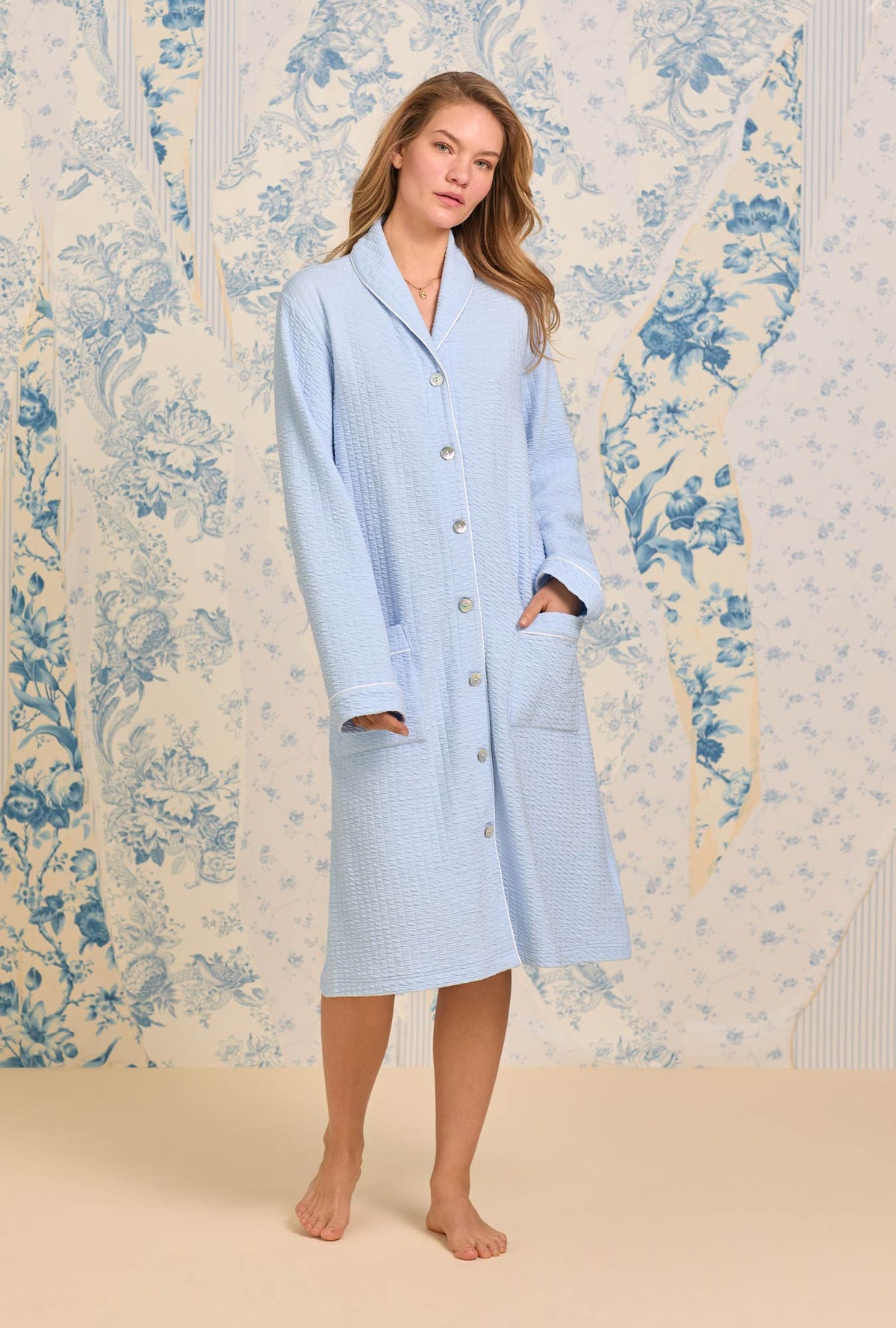 A lady wearing Sky Blue Silky Cotton Waffle Knit Waltz Button Robe