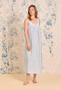 A lady wearing The "Eileen" Moonlit Lily Cotton Lawn Ballet Nightgown