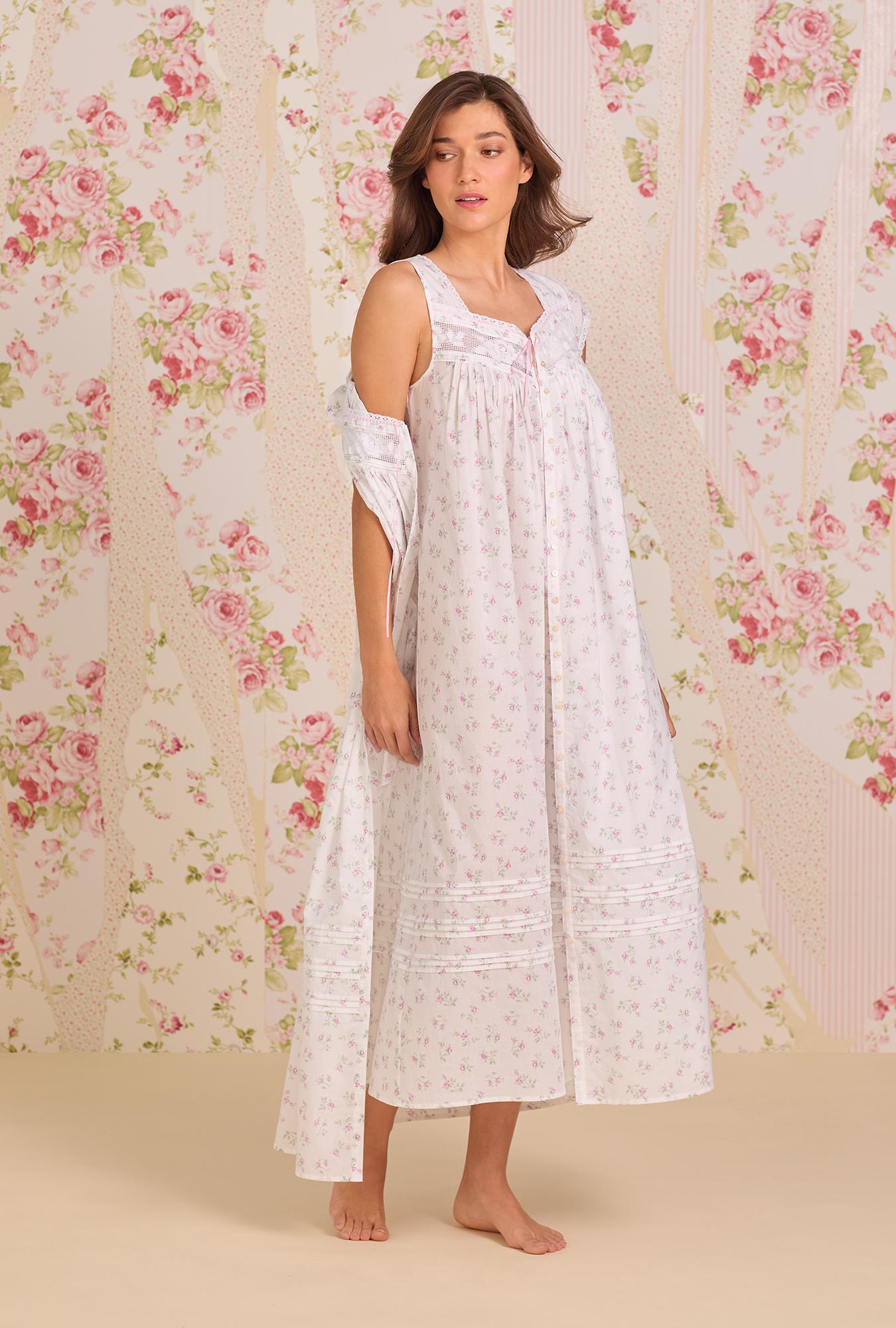 A Lady Wearing Petite Rose Cotton Lawn Button Front Robe standing in a slightly angled pose