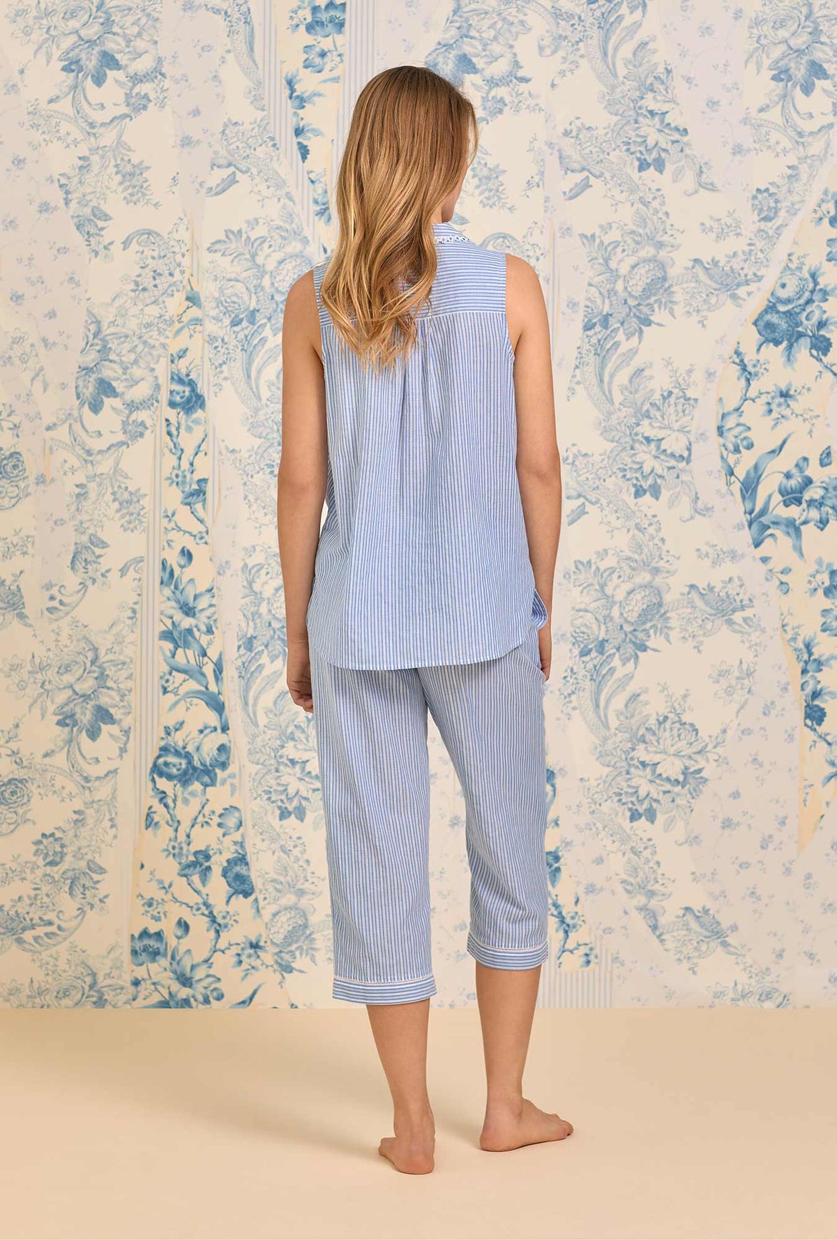 A lady wearing Iconic Blue Stripe Cotton Dobby Yarndye Pajama
