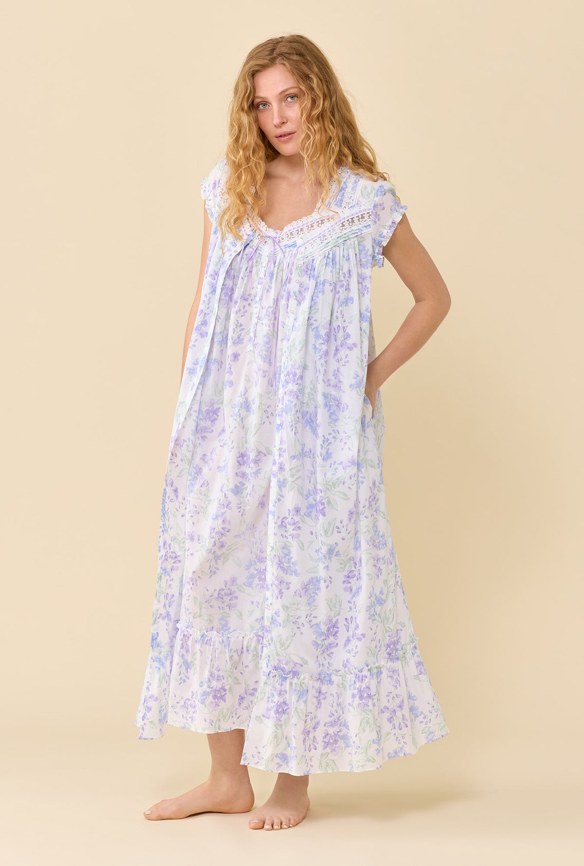 A lady wearing Blooming Arbor Robe hands in pocket