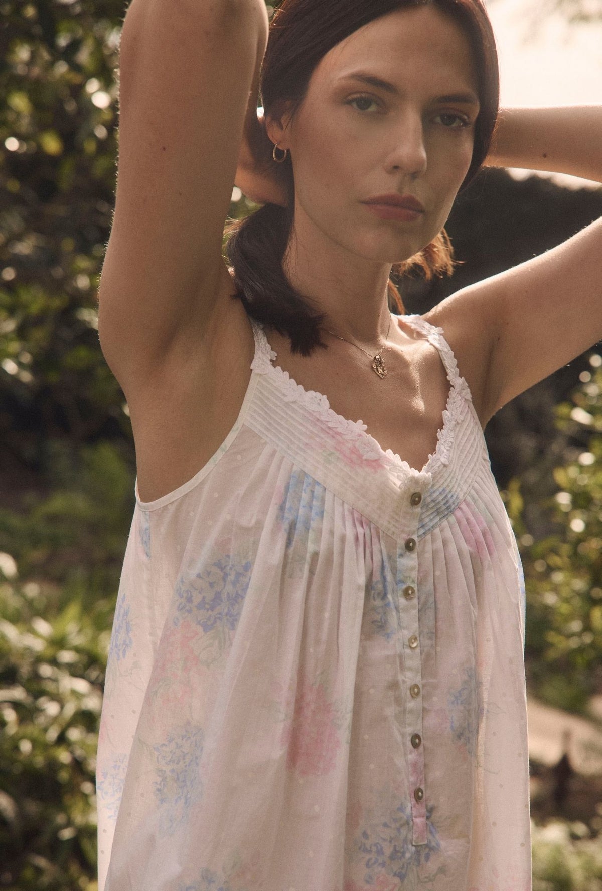 A lady wearing Hydrangea Blossom Cotton Lawn Capri Pajama closer look in the garden