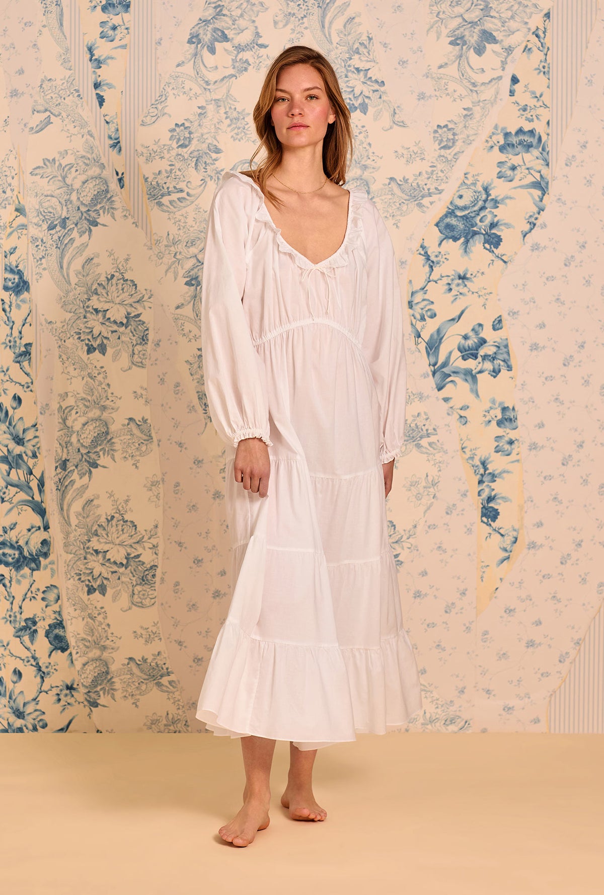A lady wearing The &quot;Vivienne&quot; Iconic White Ballet Nightgown