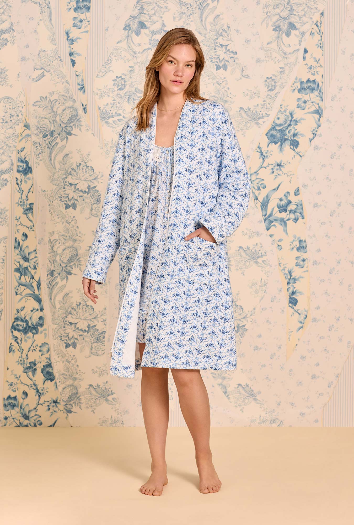 A lady wearing Celestial Bow Cotton Diamond Quilt Zip Robe