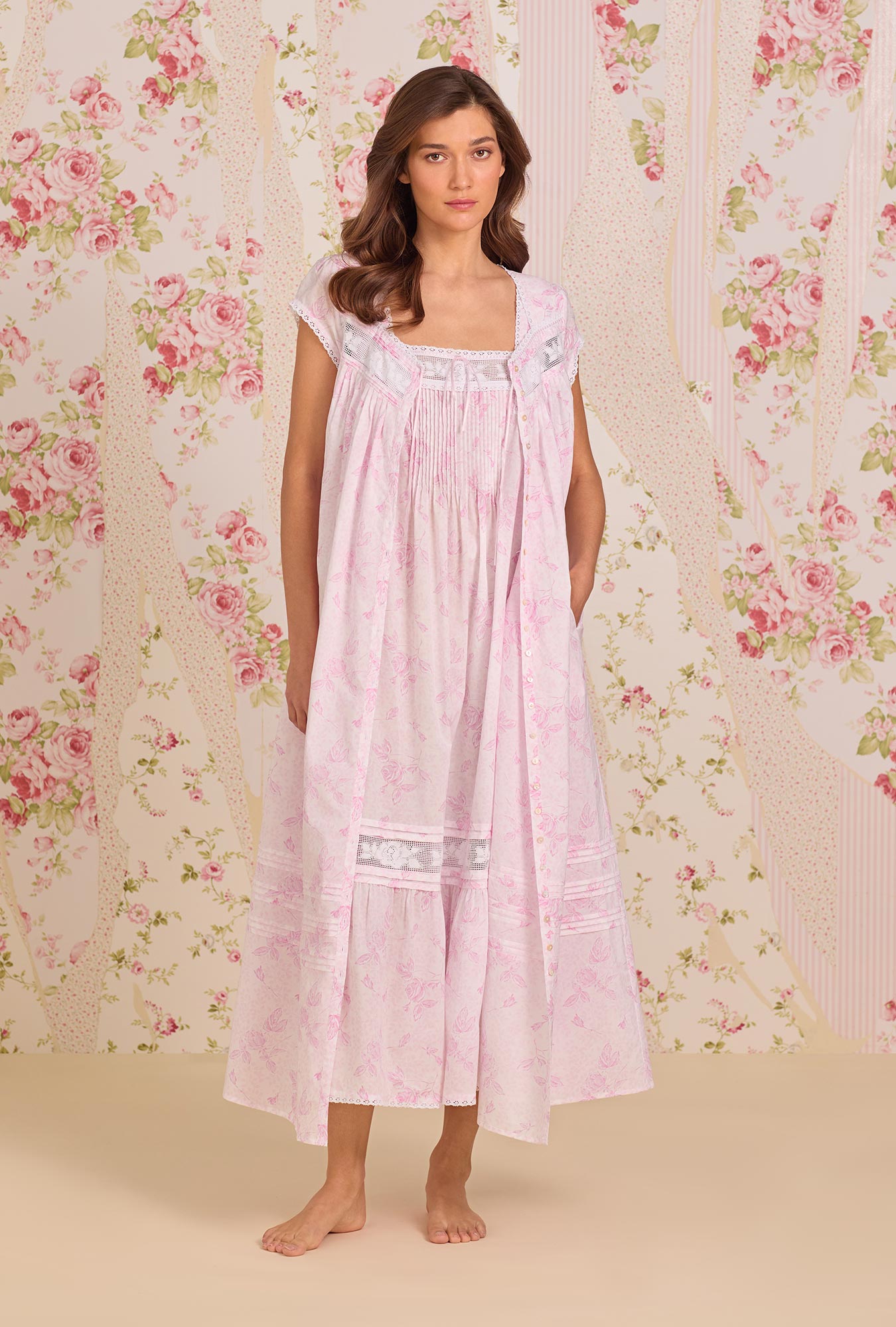 A Lady Wearing Blush Rose Cotton Lawn Button Front Robe facing front in a straight posture, looking straight ahead