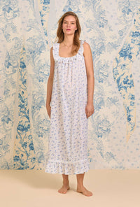 A lady wearing The "Elizabeth" Navy Floral Swiss Dot Long Nightgown