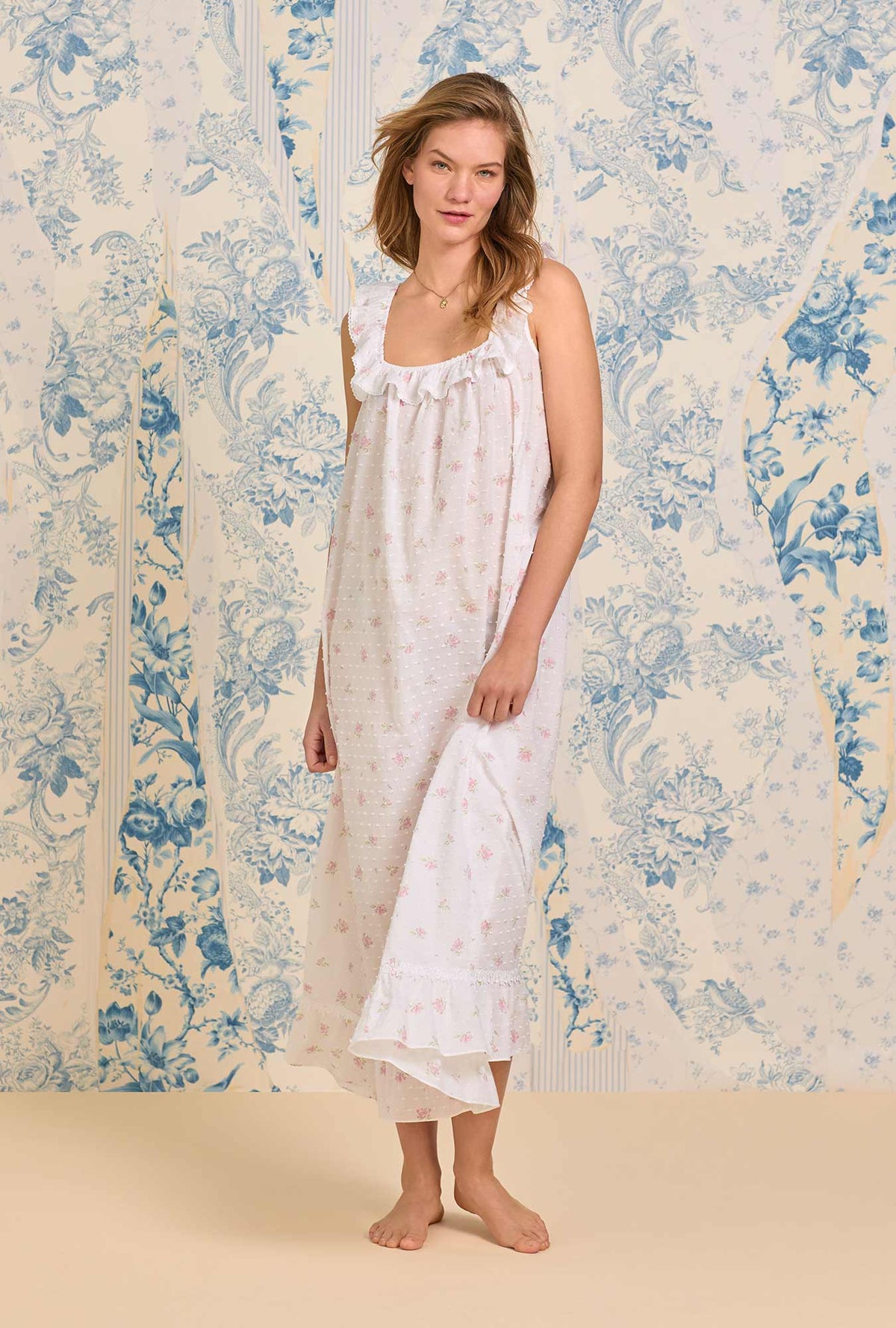 A lady wearing The &quot;Elizabeth&quot; Sweet Pink Floral Swiss Dot Long Nightgown