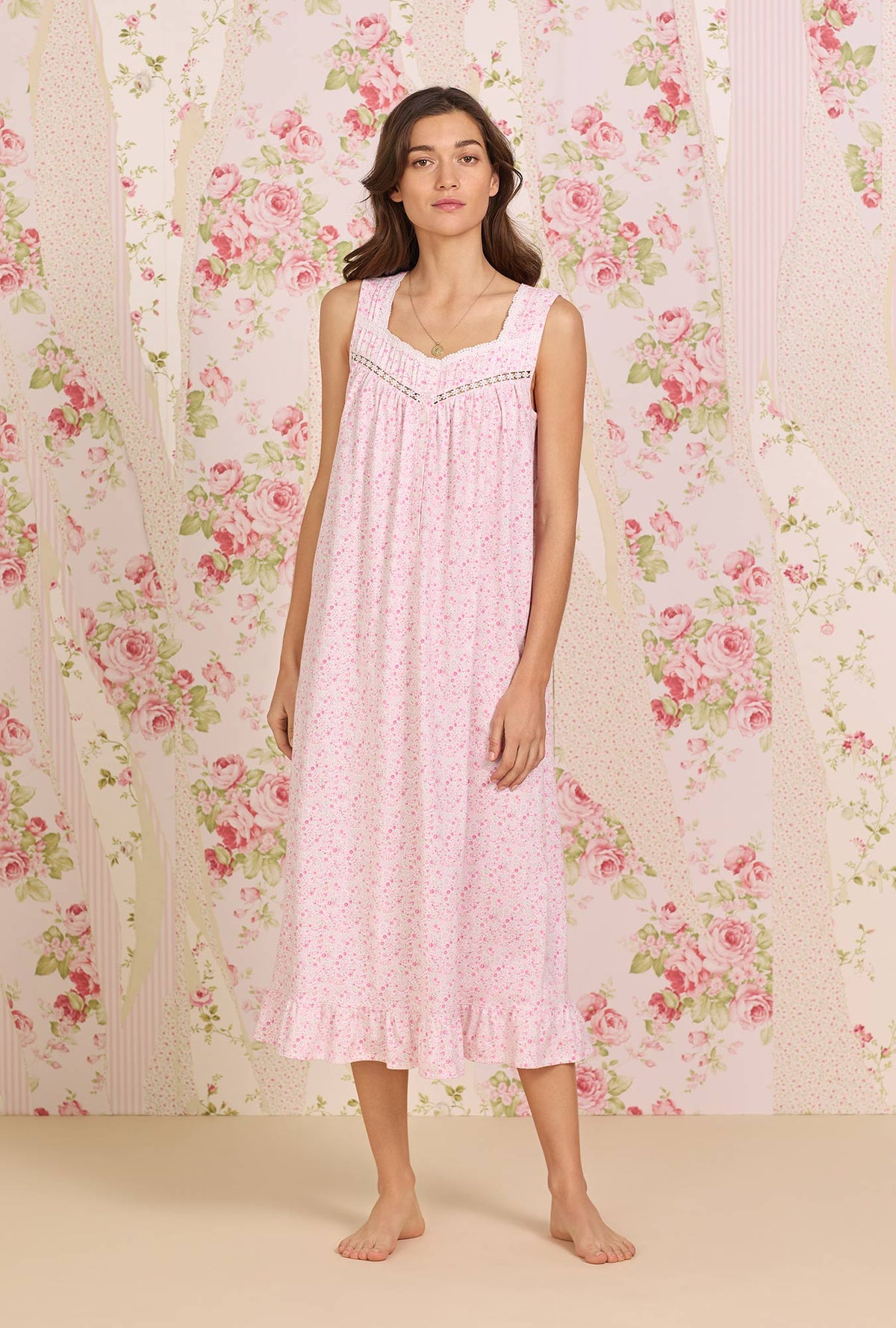   A lady wearing pink sleeveless Cotton Knit Long Nightgown with spring Garden printa