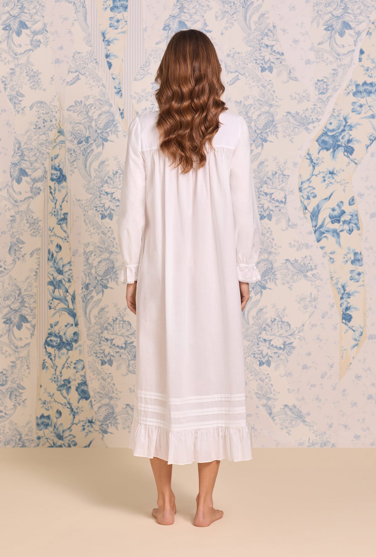 A Lady wearing Iconic White Cotton Lawn Long Sleeve Ballet Nightgown