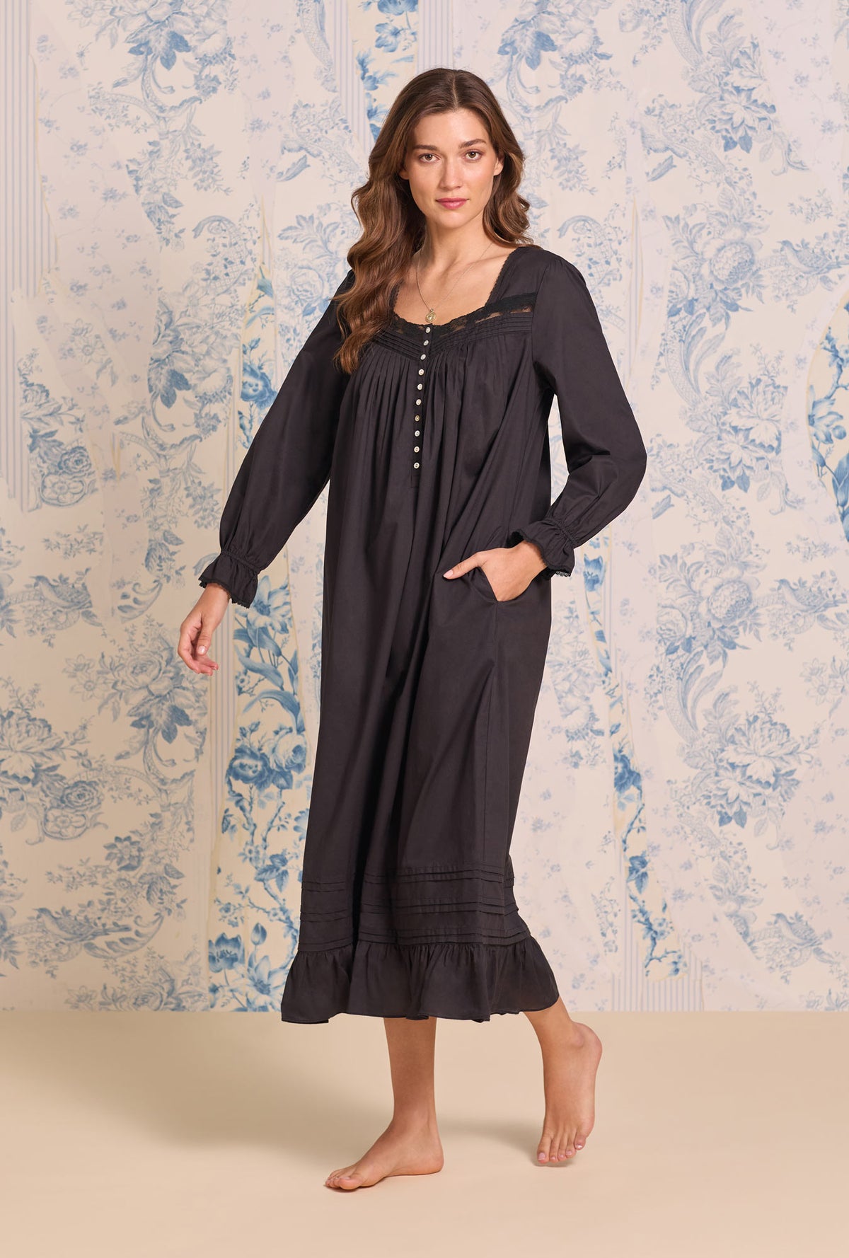 A Lady wearing Iconic Black Cotton Lawn Long Sleeve Baller Nightgown