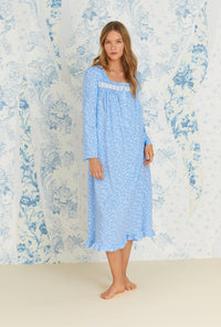 A lady wearing long sleeve blue heaven cotton knit long nightgown.